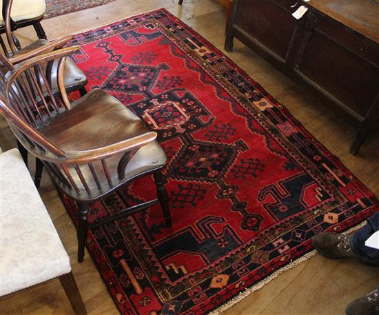 Red ground with blue design Persian rug